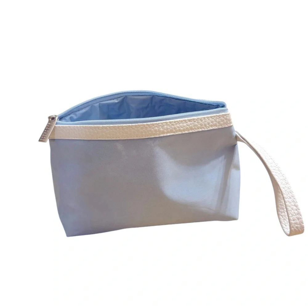 Borghese blue cosmetics bag w/travel size collection of skincare products. NEW